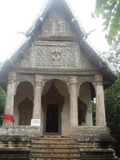 Wat Pa Huak- beautiful old temple at the foot of the Phu Si mountain in the middle of Luang Prabang