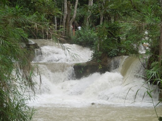 Wet season! Gushing mini-waterfalls leading up the trail to Kuang Si