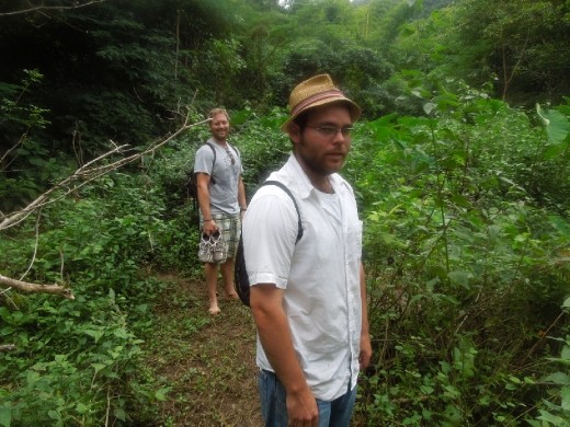 Put the camera away for the muddy scramble up the cliff to try to get to the top of the waterfall... we are now on top of the mountain, but can't find the waterfall!?