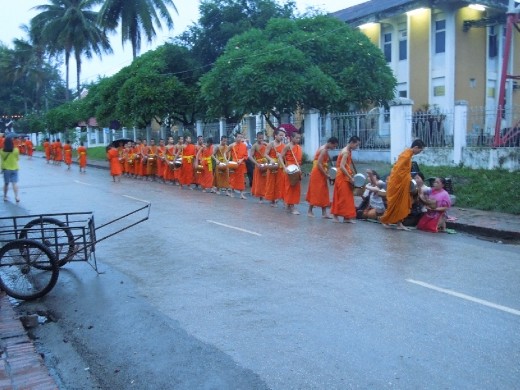 One of the most famous sights of Luang Prabang- morning procession of monks