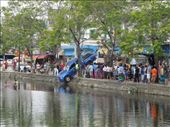 We head into downtown Chiang Mai to find a hotel... and see a car being pulled out of the canal!: by sglass, Views[312]