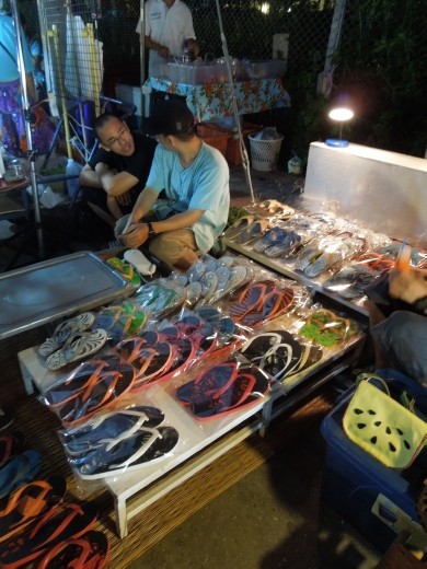 Super cool flip-flop carver at night market