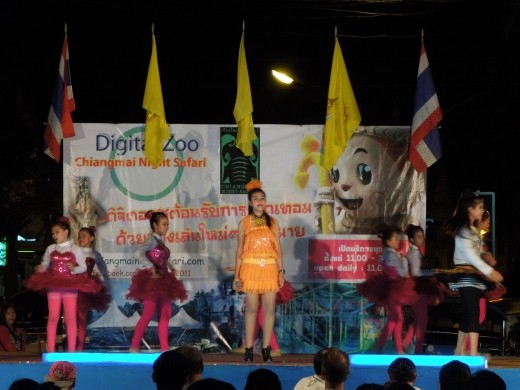 Little girls performing at the night market