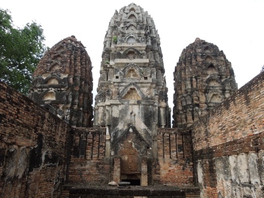 Apparently this was originally a Hindu temple which was later retrofitted for Buddhism-- this happened all the time all over SE Asia, with shifts back and forth depending on which culture/religion was in power at the time
