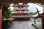 A renowned Buddhist temple set along aptly named Temple Street in Chinatown, Singapore, its distinctive shape and colour reflect the essence of Chinatown. The building, like most in the area, are red for good luck, and prosperity. The temple usually sees heavy traffic, but is a picture of serenity in the early morning.: by sharonfoong, Views[394]
