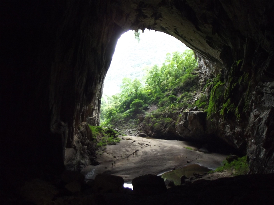 Trekking out of Hang En cave. Swapping one cave for the world's biggest cave.