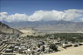 Leh, viewed from Leh Palace as the Namgyal dynasty once might have. Leh is the biggest city in Ladakh, albeit tiny by Indian standards. Its population is about 30,000 during the long and harsh winter, swelling to about 200,000 during the pleasant summer - thanks to tourism as well as the Indian military.: by sharsidd, Views[1054]