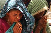 Two of the village's older residents kneel to pray before a meal one afternoon. Though beliefs vary from village to village, faith is an important part of villagers' daily lives. With problems such as little access to basic medical care and frequent water shortages, the villagers often rely on prayer and their faith to help them work through these difficult situations.: by shawnpittman, Views[424]
