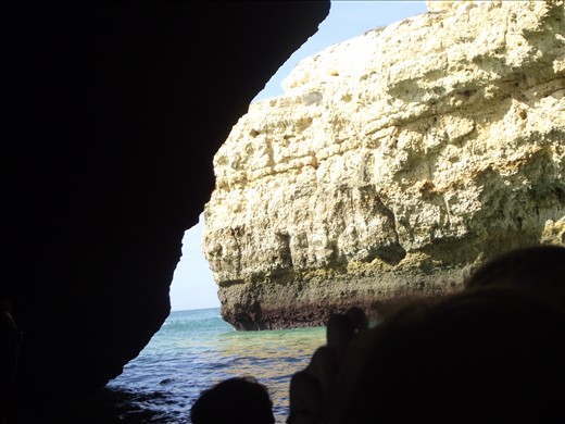 Exploring the caves on a dingy