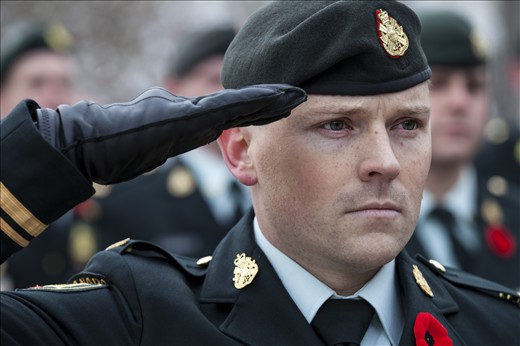 In honour of those who were willing to sacrifice their lives for their country, the “21 Gun Salute” of the Remembrance Day Ceremony, gets the crowd’s attention as the boom of each blast rolls over Churchill Square and bounces off the office buildings to echo through the urban jungle.  The intensity of the Canadian soldier’s piercing gaze and his frozen salute reflects his dedication to serving his country with pride and dignity. This is a day of remembrance and also a day of celebration of the freedoms Canadians enjoy as a sovereign nation.