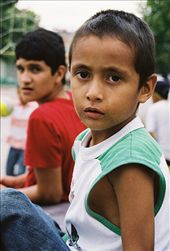 Neighborhood children take a break from the volleyball game, for a stranger with a camera.: by shiftingshutters, Views[389]
