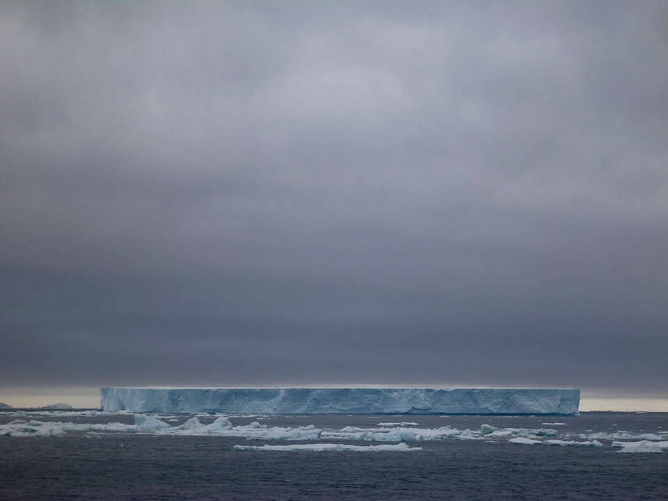 NOT ALL CHANGE IS GOOD - 

It's like a gunshot in pin drop silence when the ever calm atmosphere of Antarctica is shredded apart every now and then these days when large chunks of ice break off into the water. Although billed as a natural phenomenon by scientists, day by day, the rate at which the ice is breaking now is counter productive as there is little to no time in recovering that lost ice before the next big 'break'. What I've captured here is a part of the Larsen B ice shelf that broke off in 2002, which is one of the largest break offs known to recent humankind. Experts suggest that this was due to series of warmer summers in Antarctica and that, is a clear heads up to Climate Change.