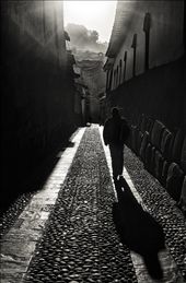Early one morning at the crack of dawn, after attempting to photograph a Cusco sunrise, I spotted this man walking up the Calle Triunfo, a famous Incan stone-walled alley.  It was in this moment that I began to see how the Andean people navigate (literally and figuratively) the ancient and modern aspects of their city.: by shirak, Views[535]