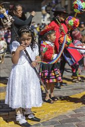 This young girl paused to glare at me during a morning procession of her kindergarten class (one amongst many) that paraded around the Plaza de Armas preceding the grander processions during the festival of Corpus Christi.: by shirak, Views[638]