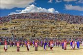 Hundreds of colorful onlookers watch the equally colorfully clad participants from the tops of the Saqsayhuaman fortress.  Thousands of people come from all over the world every year to watch this performance.   Even though it is now a pageant, for those chosen to participate in the reenacting, it's a great honor and a source of cultural pride, a reminder of the importance that the sun had for their Incan ancestors. : by shirak, Views[945]