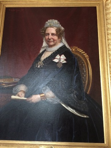 The reason I took this photo was because of the art itself (I don't recall exactly which royal this was). I'm not sure if you can tell from this photo, but if you look at the lady's face it looks like a photograph itself rather than a painting. It took me a moment to decide that it was indeed really a painting.