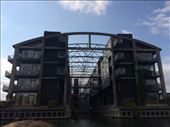 From the canal boat tour - one of the previously industrial/shipping areas turned into residential housing without completely destroying the former building. Notice the arching steel at the roof line.: by shire_girl, Views[204]