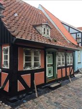 The dormer on this house is from the poop deck of a ship. Rick Steves calls this the cutest house in Aeroskobing, which is saying something considering the choices!: by shire_girl, Views[786]