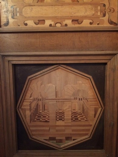 Inlaid wooden paneling.