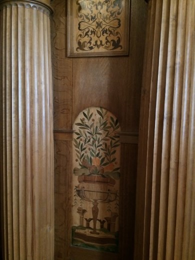 Inlaid wooden paneling. 