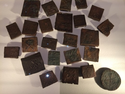 Coins of the lowly sailor. A week's worth of wages I believe.