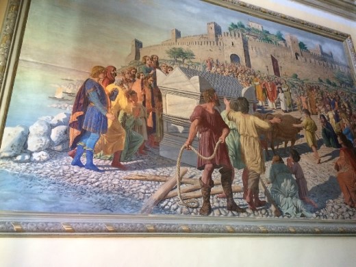 A painting depicting the boy and his cows who were able to move the coffin when no one else could. 