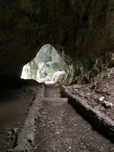From one of the cave entrances in lower Plitvice lakes. If you have a flash light you can even wind your way half a dozen yards or so into the blackness of the back.