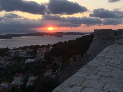 The last moment of sun as a molten ball.