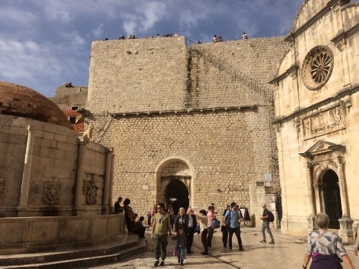 The beginning of The Wall with an enormous globe like fountain on the left in Dubrovnik.