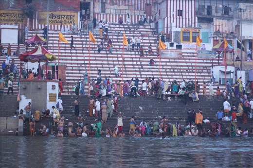 Varanasi city has nearly 100 ghats(riverfront steps leading to the bank of river).Most of the Ghats are bathing and puja ceremony ghats,while a few are used exclusively as cremation sites.This is Kedar Ghat which is used as a bathing and puja ceremony ghat.Where one can observe the vibrant elements of human characteristics and their believes on almighty.