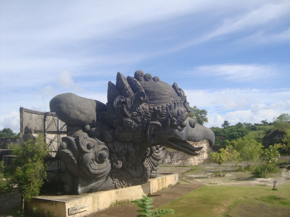 Tourism object in Bali, Garuda Wisnu Kencana from the right side. Greatest Statue in Bali with blue sky 