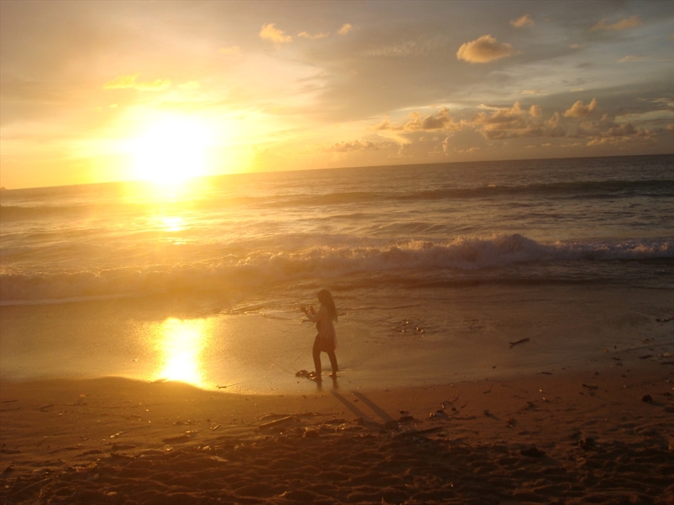 Sunset at Dream Land beach Bali with one girl object
