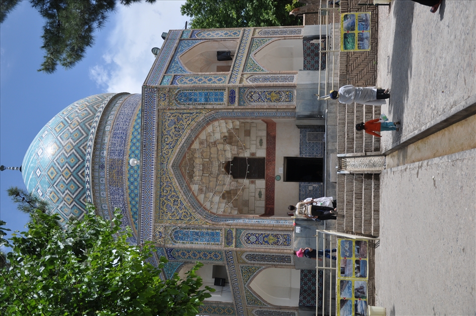 Water then flows down in to the front yard of shrine