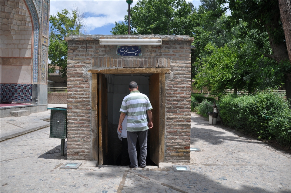 The Holy Spring entrance,peple go downstairs to drink or take curative water