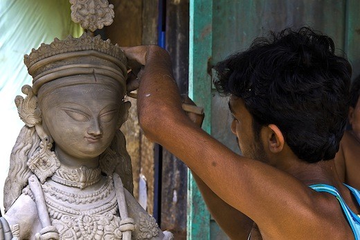 Sculptors and artists craft clay images of the Goddess Durga months ahead 