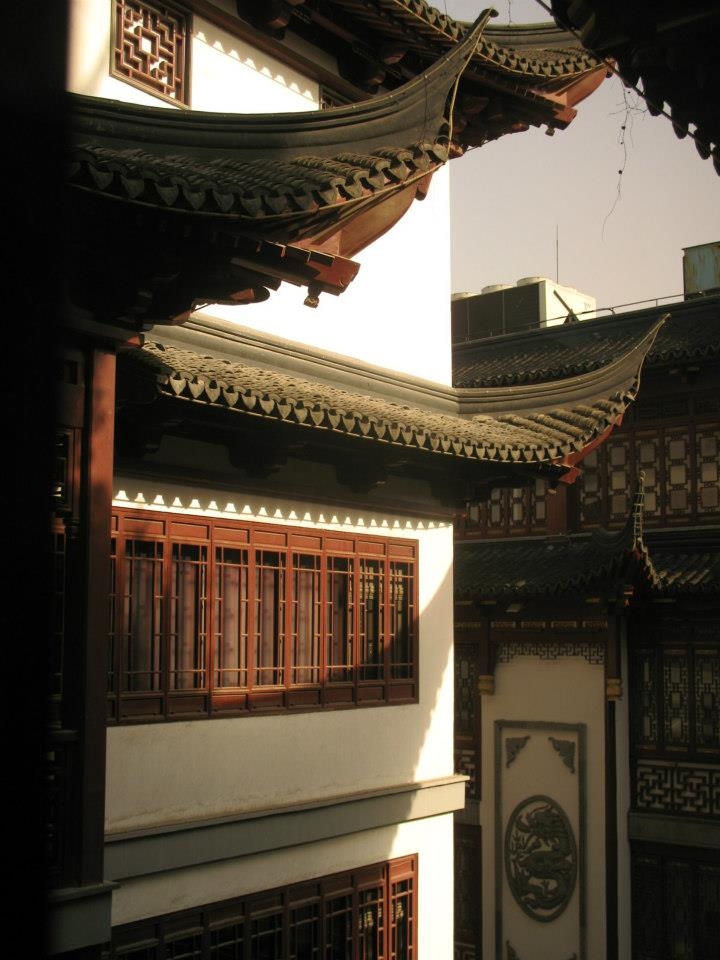 I am in LOVE with ancient Chinese architecture. This building however is only a few decades old but is still so lovely. One thing I am unhappy about this shot is the air conditioning unit on the roof of the background building. If I had photoshop I would edit it out in a heartbeat. 