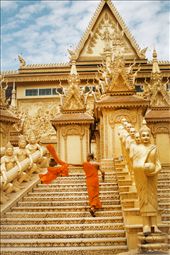 These pictures tell about moments I encountered on the streets in and around the two biggest cities of Cambodia. In the often very poor surrounding there is still something beautiful and peaceful in the atmosphere.
This pagoda is the most beautiful I have seen in Cambodia so far. I loved the steps and stayed there for one hour and waited for something to happen on those stairs. Then a monk appeared and flung his robe around his shoulders.: by sicanius, Views[291]