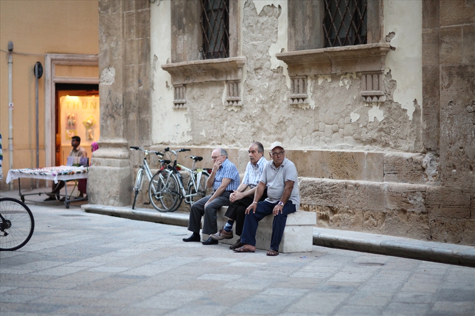 Men in Sicily. Past. Thoughts. Regrets. Time passing by. Silence.