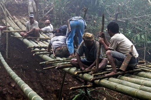 People work together to build bridges