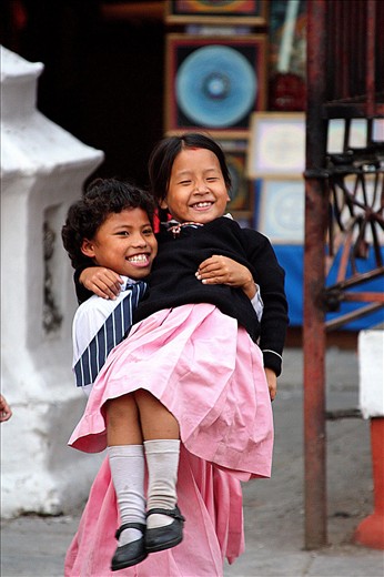 Nepaliese kids playing outside a school in Khatmandu