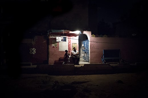 Many slum residents set up grocery stores in homes for extra money to survive.