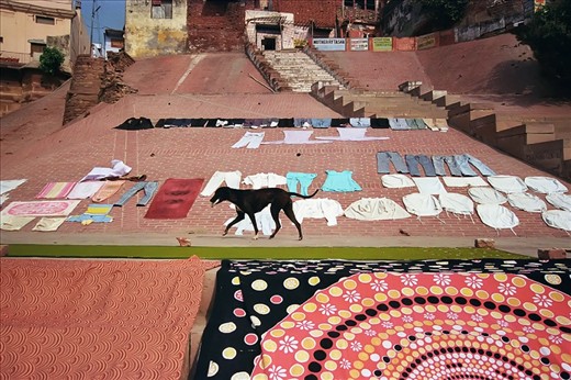 Three days in Varanasi, one of the oldest continuously inhabited cities in the world and the oldest in India, and a series of images with the intention to capture the daily atmosphere of the children living along the banks of the Ganges River. Every morning the dirty laundry are washed in the Ganges and stretched out to dry along the shore. Elderly and children alike participate in this activity that begins immediately after the first rays of the sun.