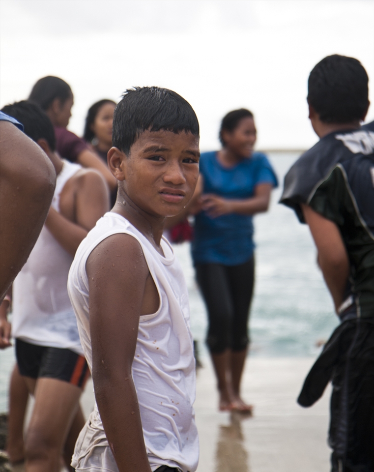 Tongan dress is very conservative and it is actually against the law for men to swim without a shirt on. Because of this, Tongans usually swim fully clothed.