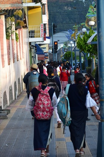 The town gets busy – children are off to school, people go to work, the markets are now open.