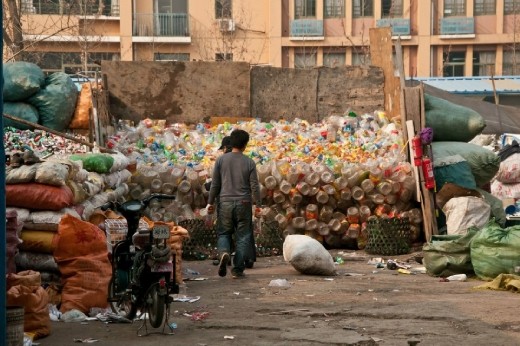 The thing i like most of Tianjin is recycling. It's a big metropolis but still old mentality and way to organize things are useful and functionality.
The recycling works in different ways. The most common is that every morning a man of a lady, Shifu, carries a handcart bike to collect all the recycle materials. They collect and pay you for the quantity of material you give to them. 
Another is that worker of the residence look to your rubbish and select the recycle materials. Another one is that some people, poor, look for your recycle trash. 
Anyway if all funcionality for the purpose of recycling. 