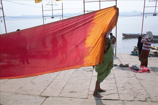 A local woman dries a sari in the late afternoon sun 