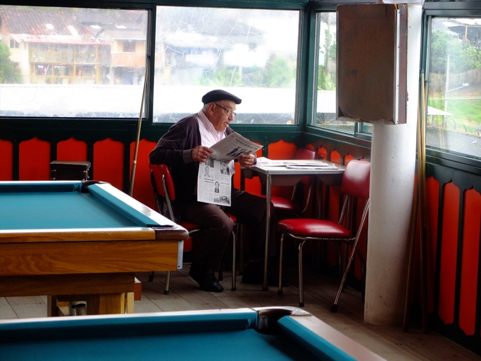 An elderly gentleman reads his paper in one of Salento’s billiard halls. Throughout the day and late into the night men gather here to play and bet on this popular game. The aroma of coffee fills the air as locally grown beans are prepared in huge old fashioned machines, some of which date back over 100 years.