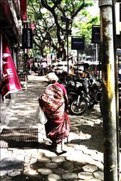 Bare feet, plastic bag and a wooden stick acts as her only support: by simorinp, Views[246]