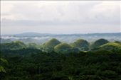 The sunlight was generous that day I walked up the Chocolate Hills of Bohol. With its ability to resemble chocolate kisses when its grasses turn brown in the dry season, it is easily one of my country's National Geographic monuments.: by simplyserica, Views[561]