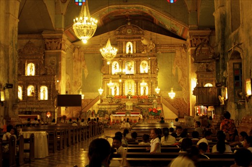 On trails of Spanish influences, step into a bygone era at the Church of Our Lady of the Immaculate Concepcion.  It was built in the 19th century, a time when cement wasn't around yet. Instead they used egg yolks for its construction.

A congregation was in the middle of a mass at the hour of my visit, its interiors undeniably well-lit. 